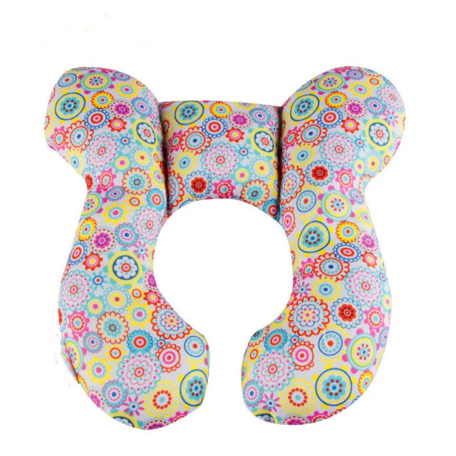 U-shaped baby head support pillow with colorful floral medallion pattern cover