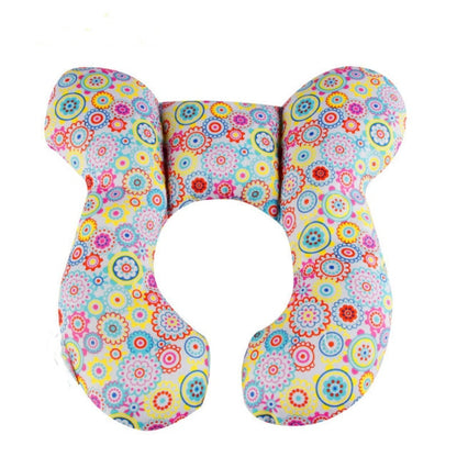 U-shaped baby head support pillow with colorful floral medallion pattern cover
