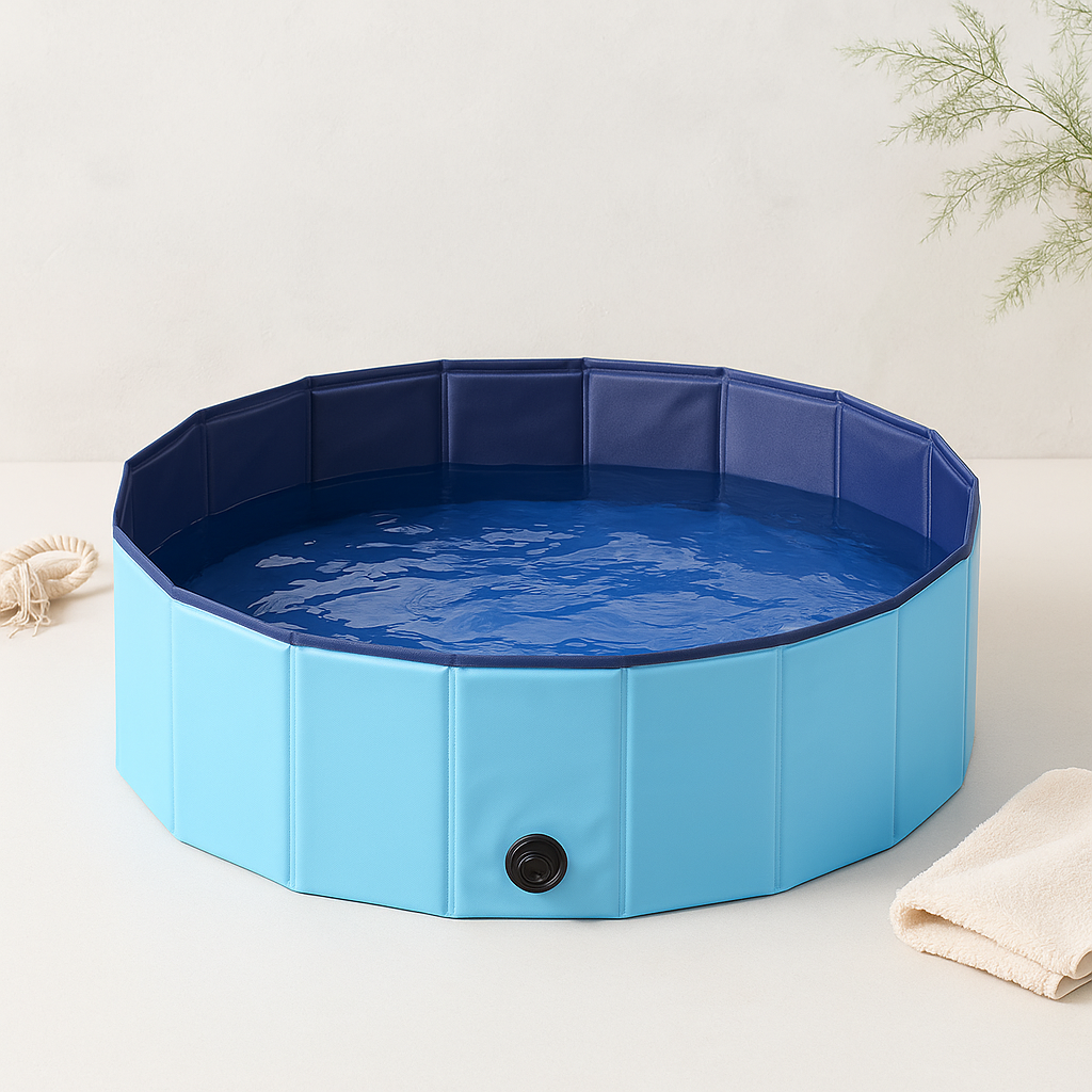 Foldable pet swimming pool, light blue walls with dark blue rim and drain plug