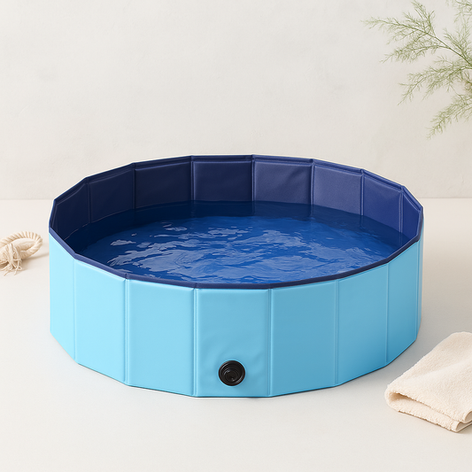 Foldable pet swimming pool, light blue walls with dark blue rim and drain plug