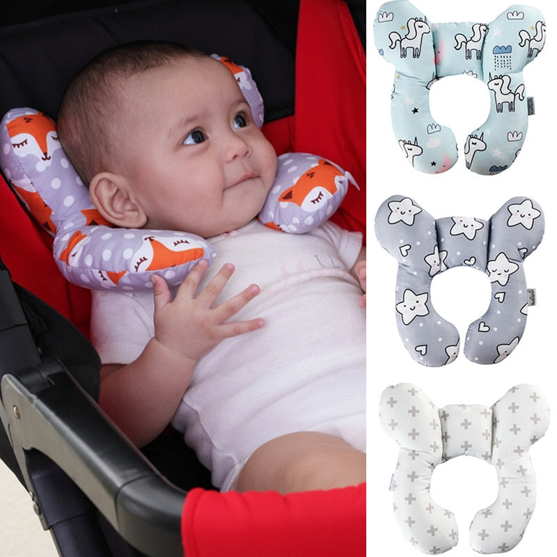 U-shaped baby head support pillow with cute animal-print cover, used in a car seat