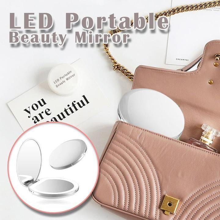 White LED portable beauty mirror with circular light ring and open lid