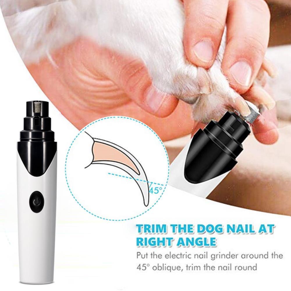 Rechargeable pet nail clipper trimming a pet paw with the grinding tip