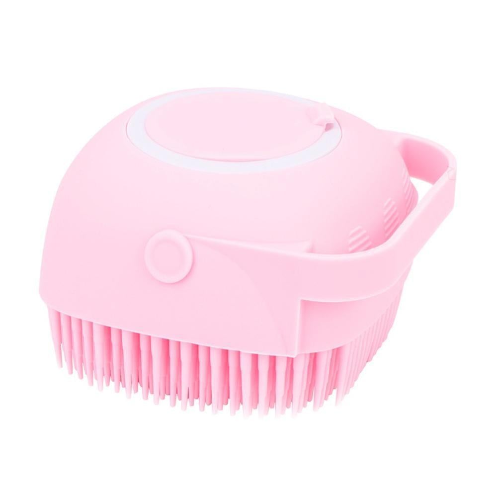 Pink silicone body bath brush with circular top and flexible bristle pad