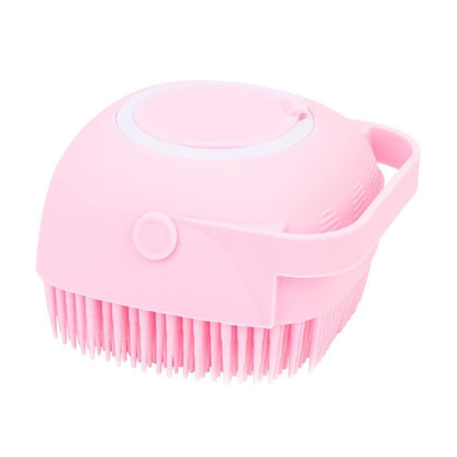 Pink silicone body bath brush with circular top and flexible bristle pad