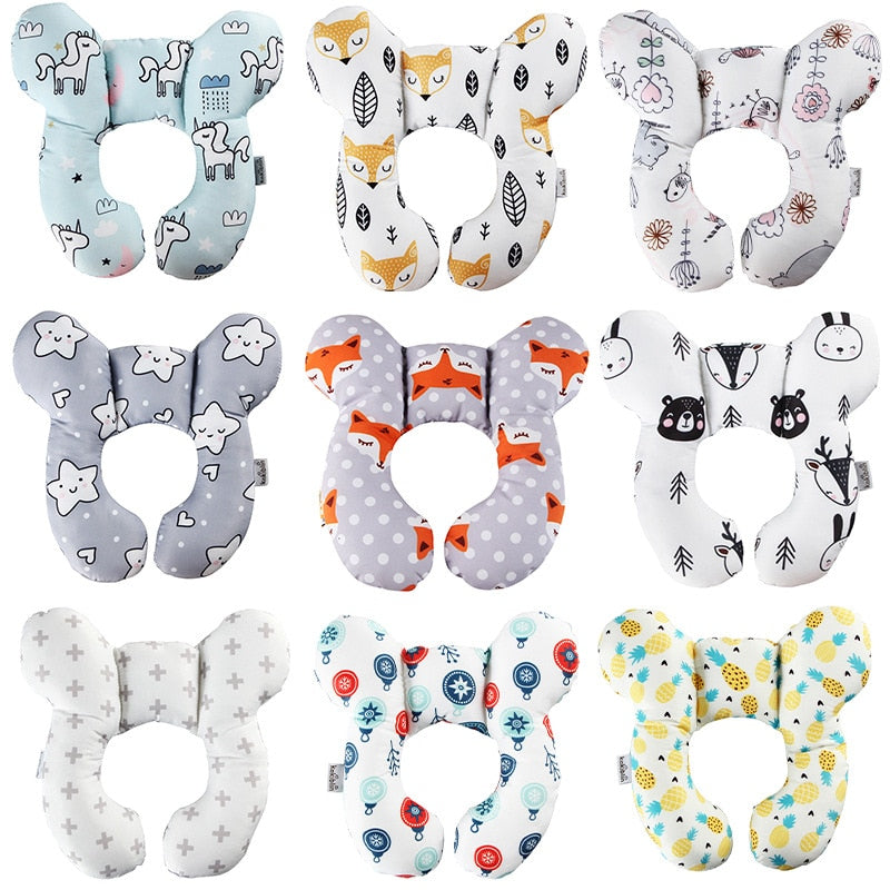 Set of U-shaped baby head support pillows with assorted animal and floral pattern covers