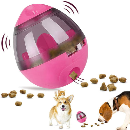 Interactive treat ball dispenser with pink shell, clear window, and flying kibble