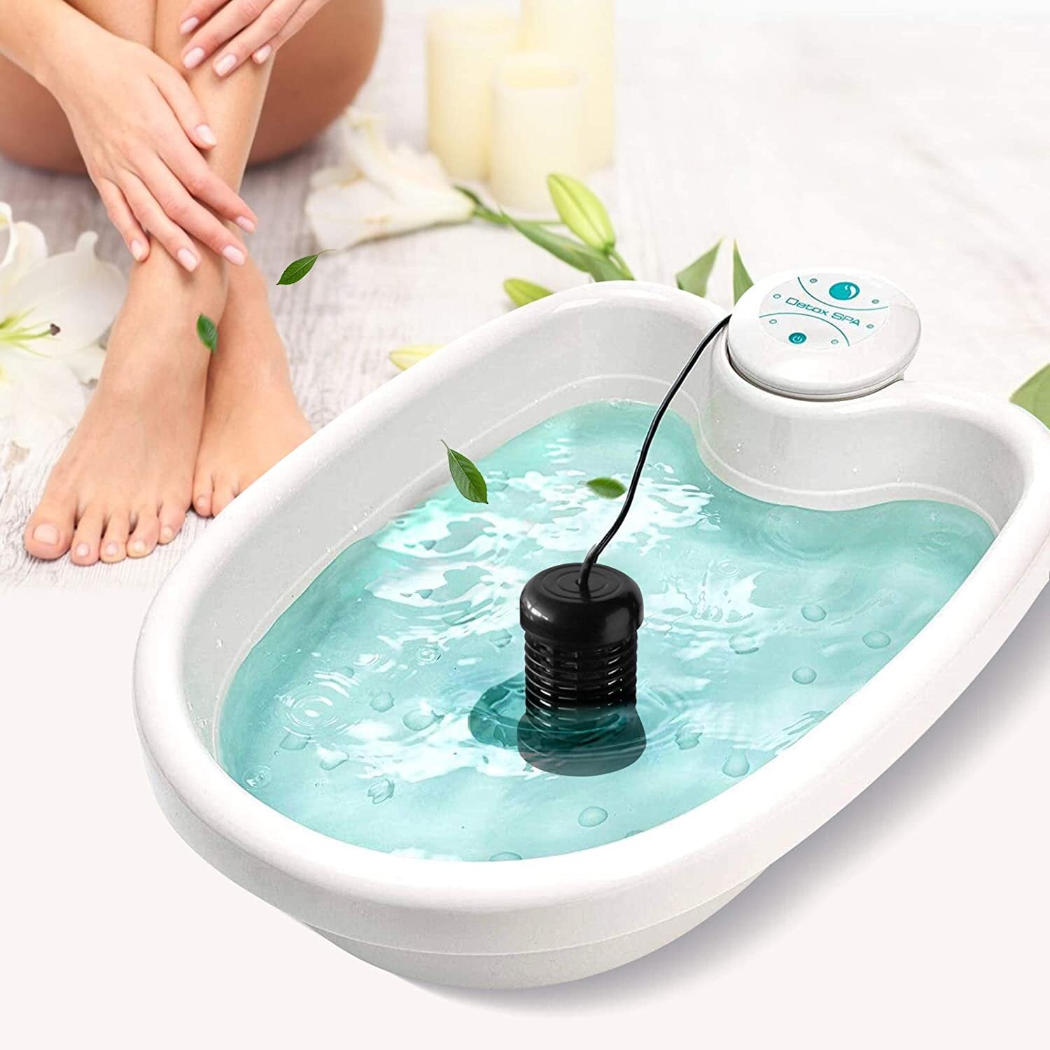 Foot spa machine with teal basin water, control unit on rim, black electrode