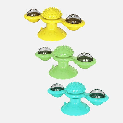 Assorted scratch windmill cat toys in yellow, green, and turquoise with light pods