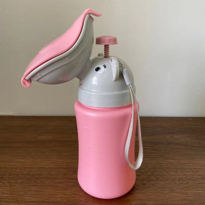Pink portable baby travel potty urinal with white base, flip lid, and wrist strap