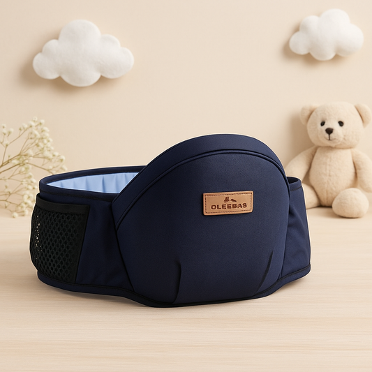 Baby hip seat carrier with padded waist belt, mesh side panel, and front logo patch.