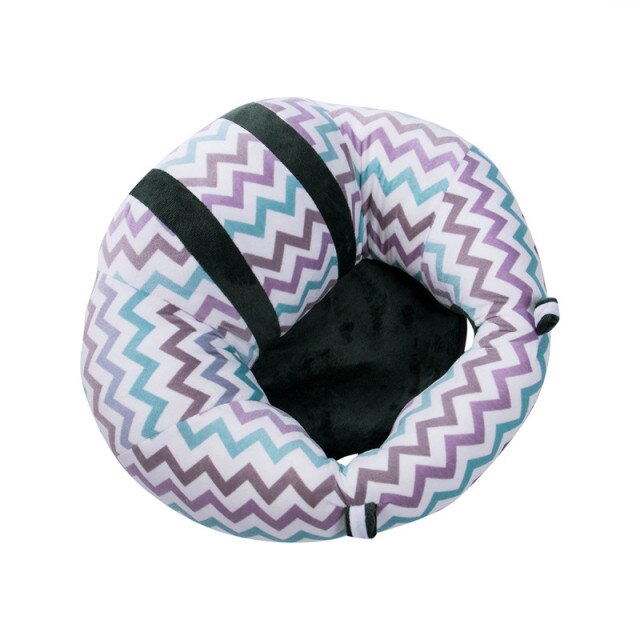 Baby sit-up support seat with zigzag print cover and black strap accents