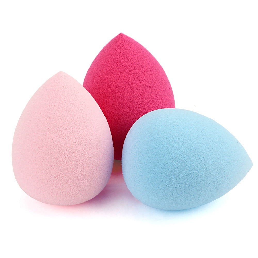Makeup sponge blender set: pastel pink, red, and light blue teardrop sponges