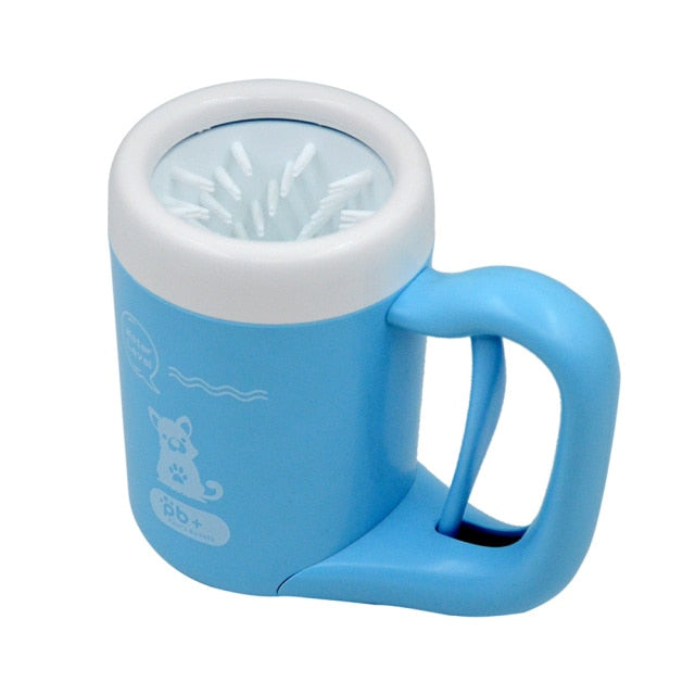 Blue dog paw-cleaning cup with white lid and visible bristle brush