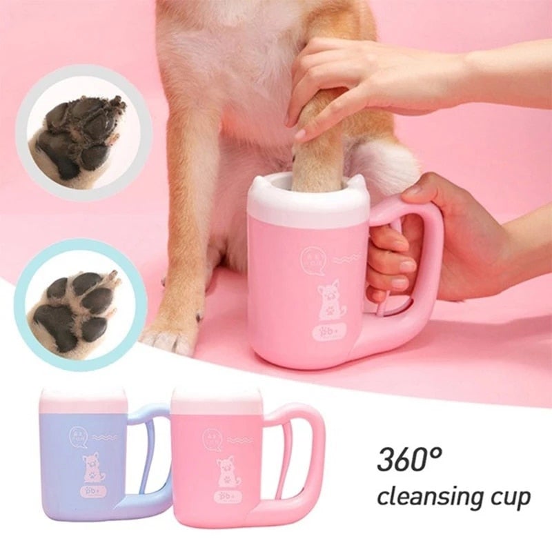 Pink portable paw-cleaning cup as a person scrubs a dog's paw