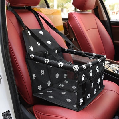 Pet car hammock seat, black with white paw print pattern and securing straps
