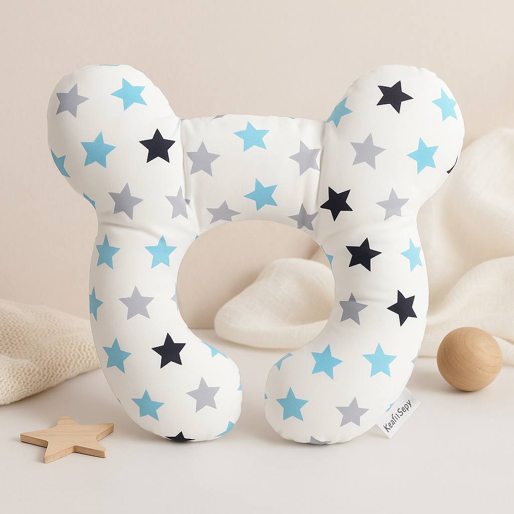 U-shaped baby head support pillow with white cover and blue/gray star pattern