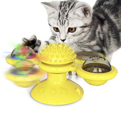 Yellow scratch windmill cat toy with spiky dome and three color-shifting light pods