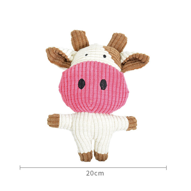 Soft plush cow toy with pink body, white legs, and brown spots