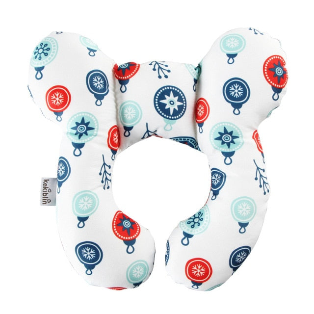 U-shaped baby head support pillow in white with colorful ornaments and bauble print