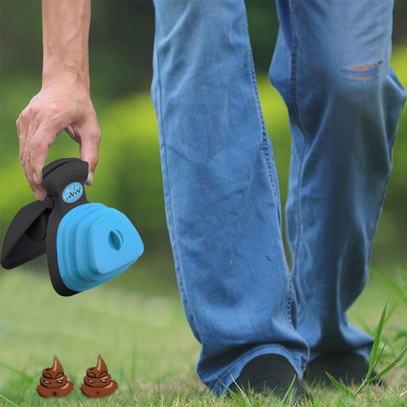 Poop picker tool in hand with blue scoop and curved handle