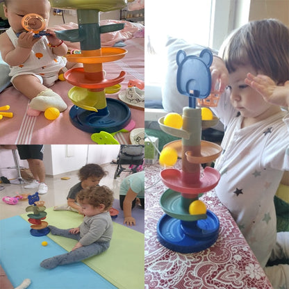 Rolling ball tower toy in use, with stacked tracks and yellow balls