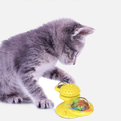 Yellow scratch windmill cat toy with textured dome and colorful light ball