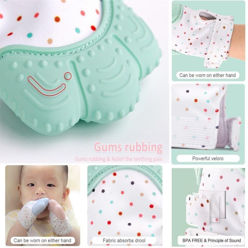 Mint and white teething mitten glove with raised thumb nubs and dotted fabric