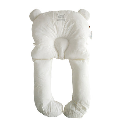 Newborn head shaping pillow, white plush with raised side bolsters and central neck opening