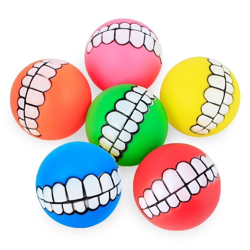 Set of rubber pet teeth squeaky toy balls: blue, green, red, orange, pink, yellow.
