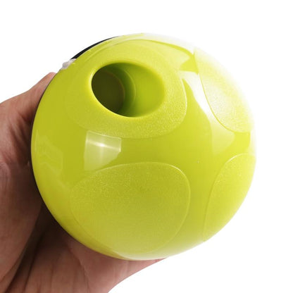 Interactive treat ball dispenser close-up in lime green with top feeding opening