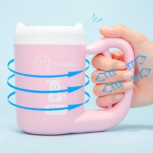 Pink portable dog paw-cleaning cup with handle and rotating brush action