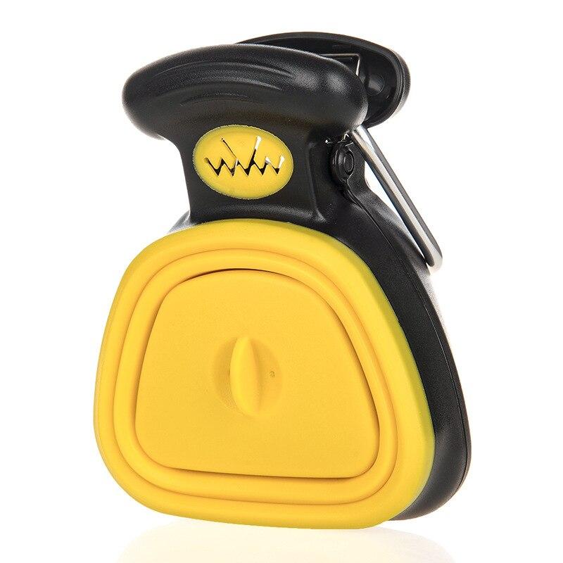Yellow poop picker tool with black case, yellow scoop, and side clip