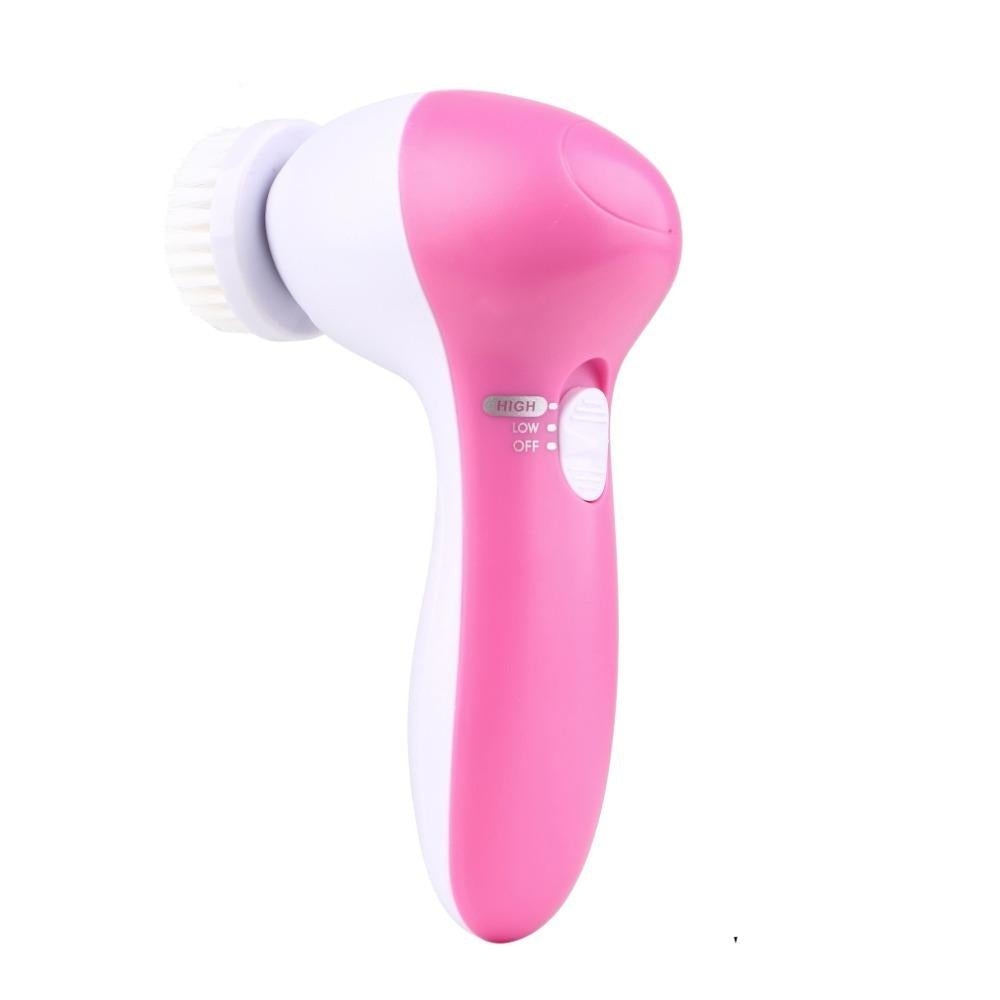 Pink and white electric facial cleansing brush with rounded bristle head